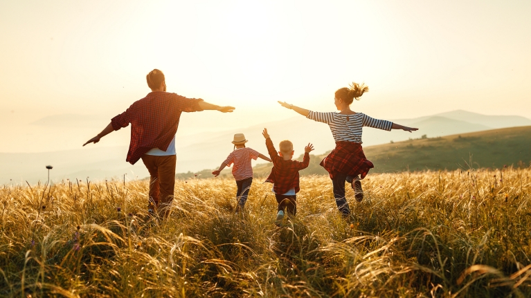 Happy family exploring Europe with Interrail